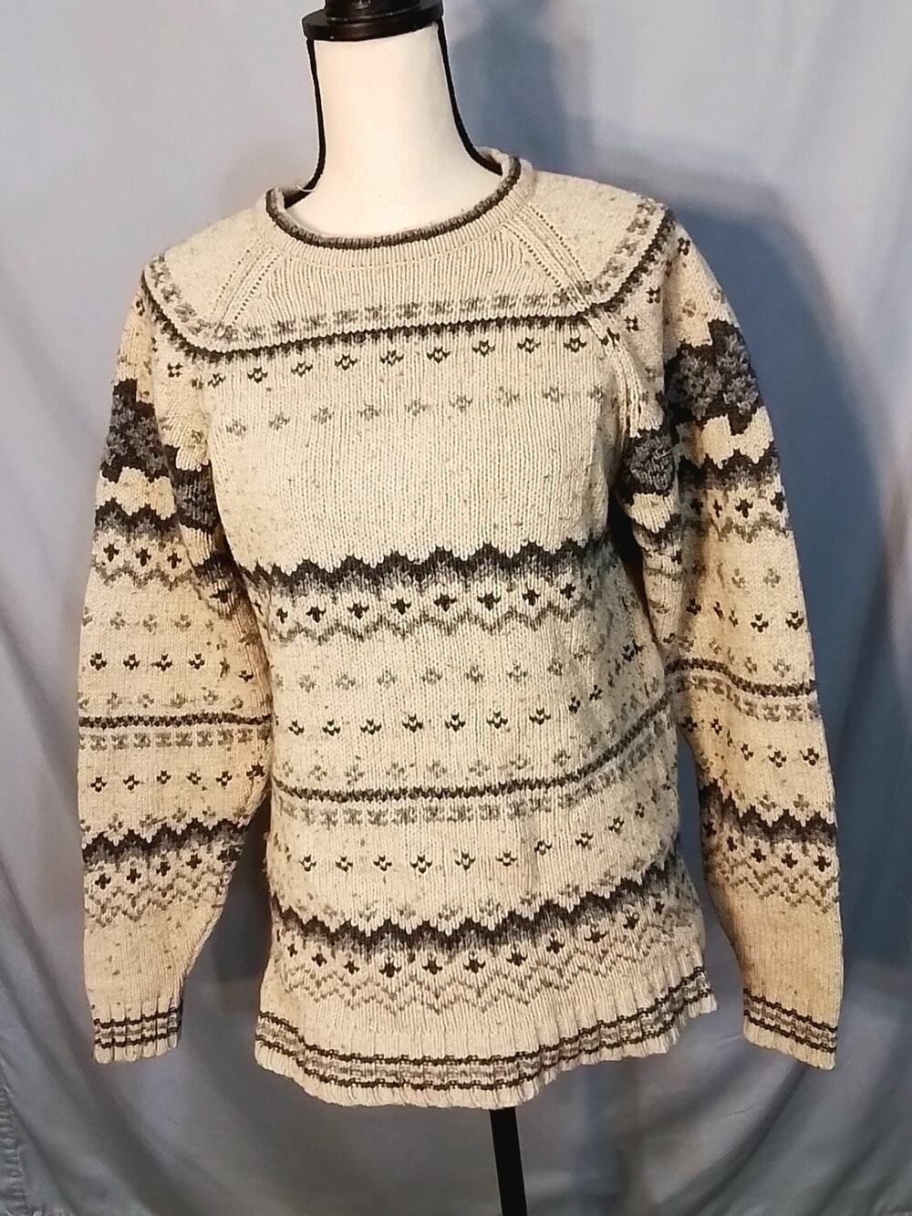 North Crest sweater. beige and gray